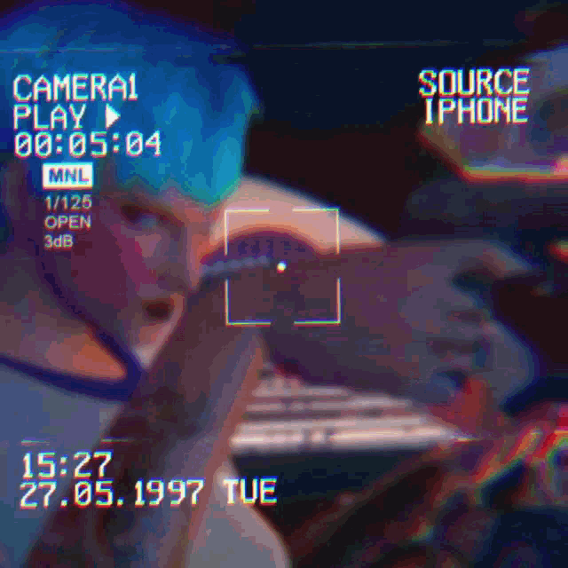 a video of a person taking a picture with the words source iphone on the bottom right