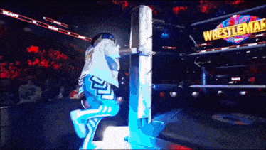 a wrestling ring with the word wrestlemania on the wall