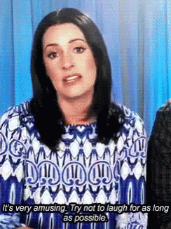 Paget Brewster Amusing GIF - Paget Brewster Amusing Try Not To Laugh GIFs