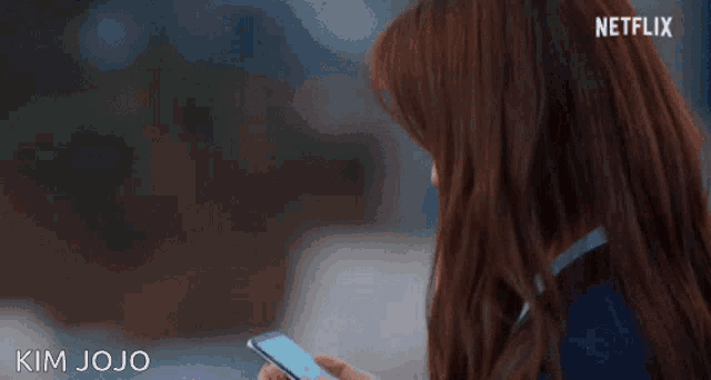 a close up of a woman 's face with her eyes closed in a netflix ad .