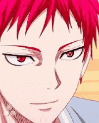 a close up of a boy with red hair and red eyes .