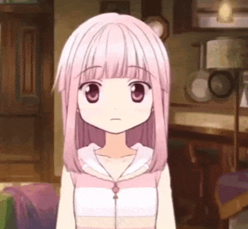 a pink haired anime girl is standing in a room with a striped shirt on .