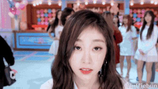 a blurry picture of a girl with the words fluffiebun written on the bottom