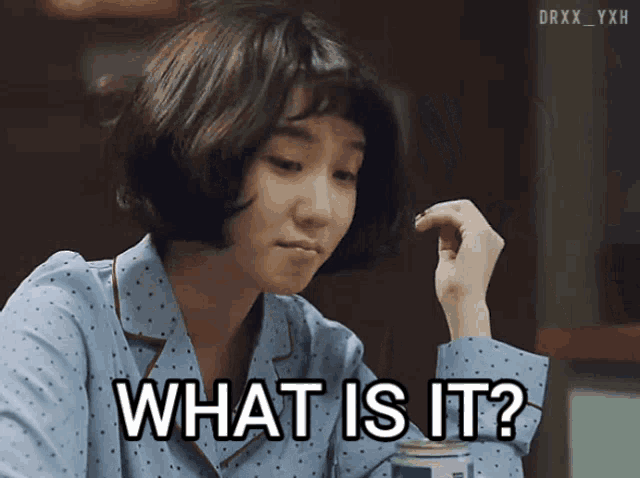 a woman in a blue polka dot pajama shirt is asking what is it