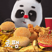 a panda bear with a red nose is surrounded by hamburgers and fries