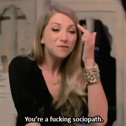 a woman is giving the middle finger and says `` you 're a fucking sociopath '' .