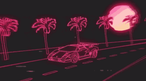 a neon car is driving down a road with palm trees and the sun behind it .