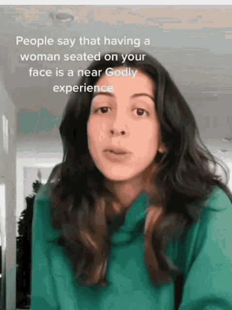 a woman in a green sweatshirt says that having a woman seated on your face is near godly experience
