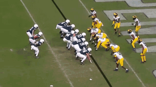 a football game is being played on a field with the word atlanta on the side