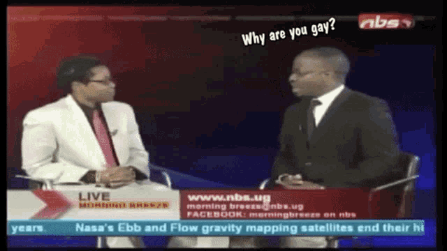 two men are sitting in front of a screen that says live morning break