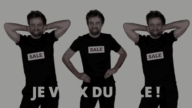 a man wearing a black t-shirt that says sale on it
