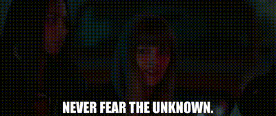 a blurred image of a person with the words `` never fear the unknown '' .