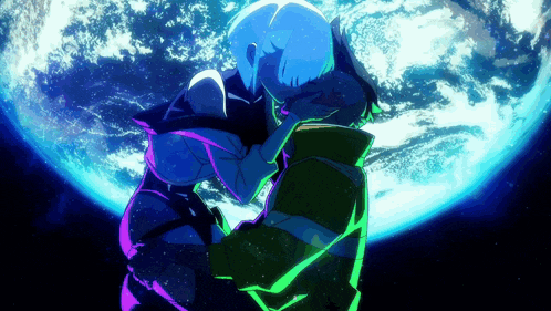 a man and a woman kissing in front of a blue planet