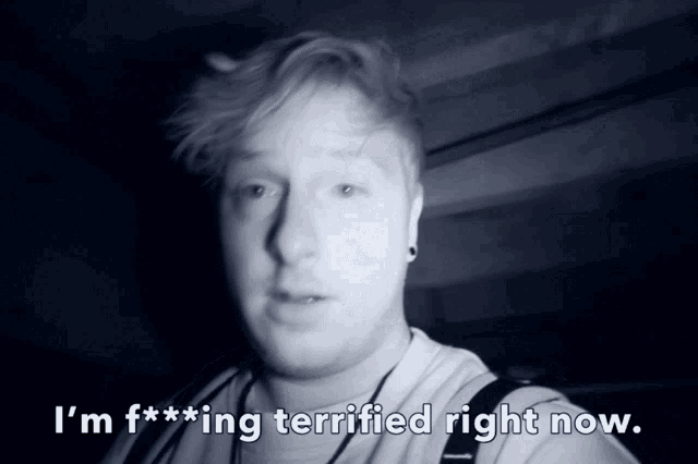 a black and white photo of a man with the words i 'm f *** ing terrified right now