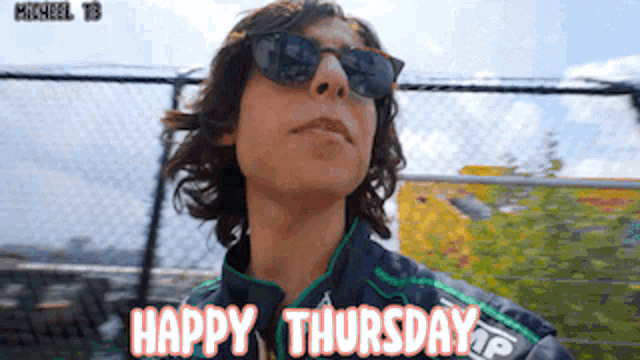 a man wearing sunglasses says happy thursday in orange letters