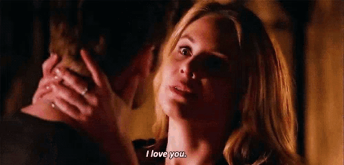 a man and a woman are kissing and the woman is saying `` i love you . ''
