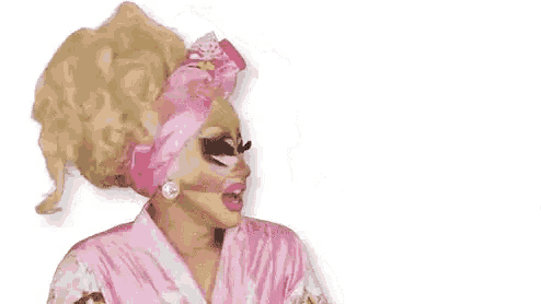 a drag queen is wearing a pink robe and a pink headband and says `` oh honey '' .