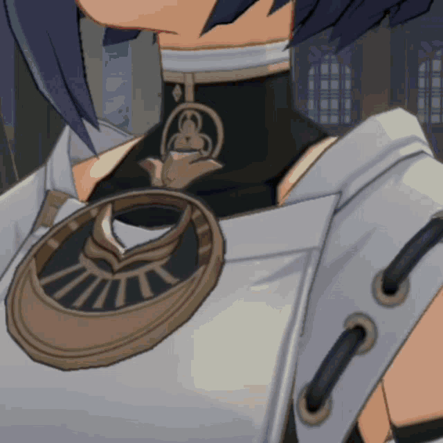 a close up of a person 's neck with a necklace on it