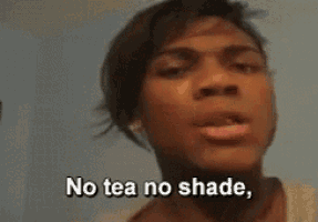 a close up of a woman 's face with the words `` no tea no shade '' written on it .
