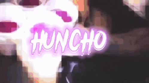 the word huncho is glowing in a purple light