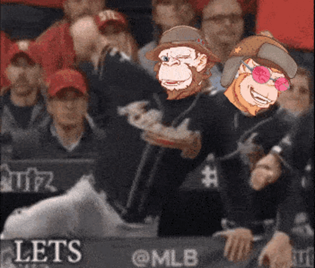 a group of people sitting in a stadium with a sign that says lets