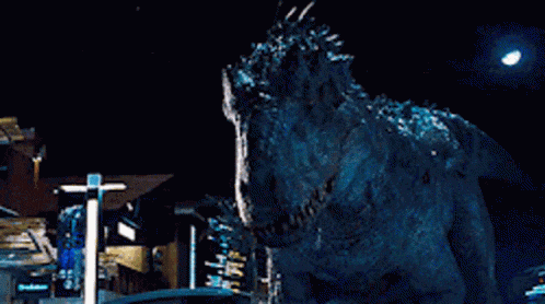 a dinosaur is standing in front of a building with its mouth open .