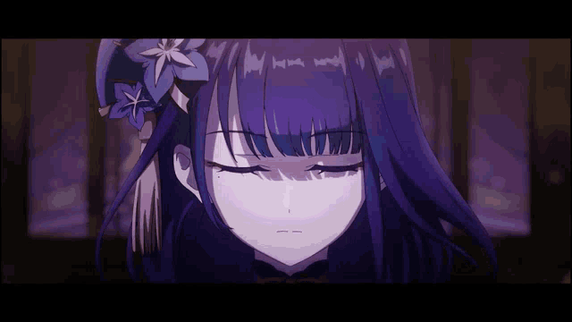 a close up of a person with purple hair and a flower in her hair .