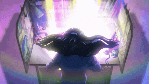 a woman is sitting at a desk with a light coming out of the window