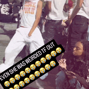 a group of people are gathered around a sign that says even she was weirded tf out