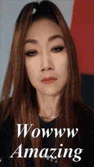 a woman 's face is shown with the words wow wow amazing written below her