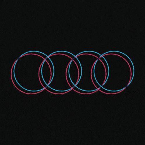 red and blue circles on a black background that look like a hula hoop