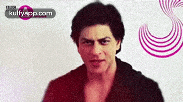 a close up of a man 's face with a pink and white background .