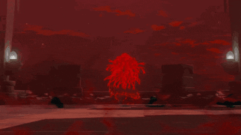 a dark room with a red glowing object in the middle of it