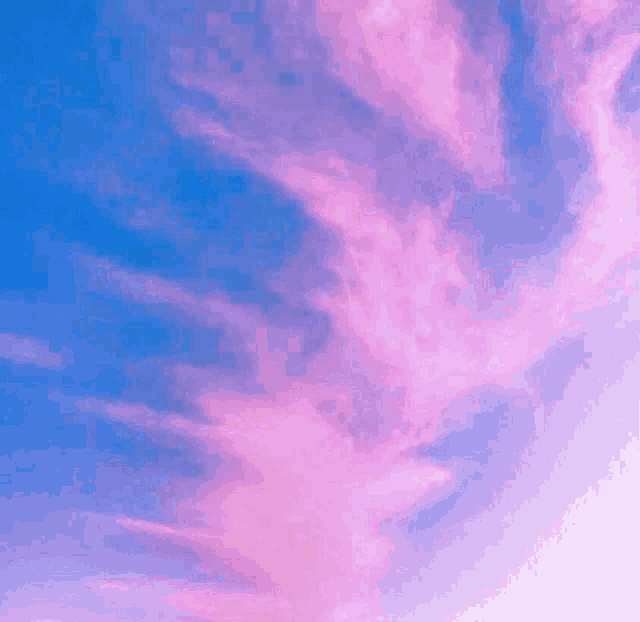 pink clouds in a blue sky with a white background