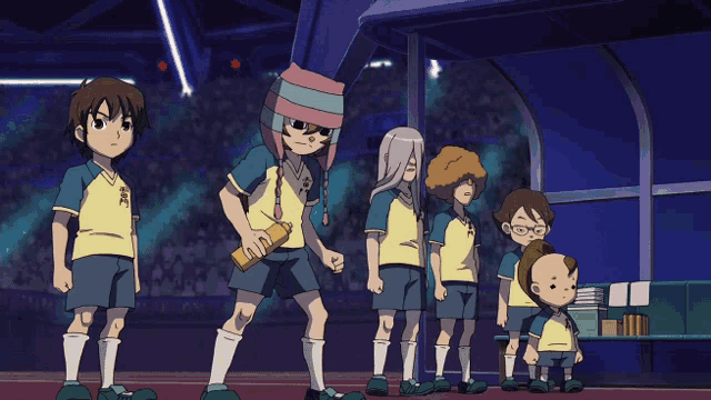 a group of soccer players are standing in a line with one wearing a shirt that says ' samurai '