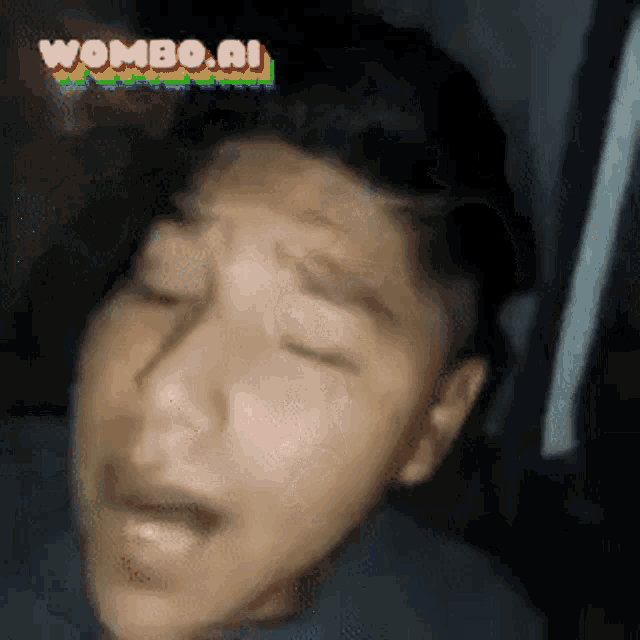 a blurry picture of a boy with wombo.ai written on the bottom right