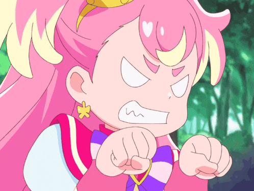 a girl with pink hair and a yellow star on her ear is making a funny face
