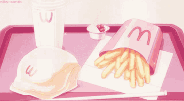 a pink mcdonald 's tray with french fries and a hamburger
