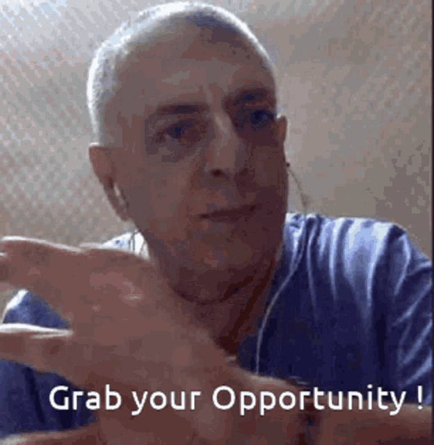 a man wearing headphones says grab your opportunity !