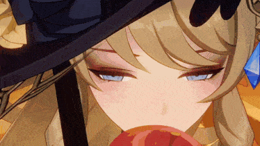 a close up of a girl 's face with a hat on