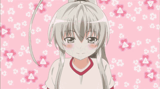 a girl in a white shirt is surrounded by hearts and bubbles