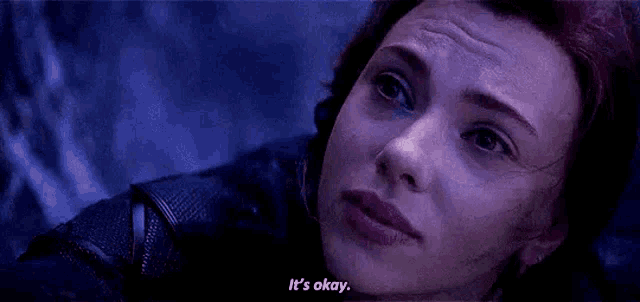 a close up of a woman 's face saying `` it 's okay '' .
