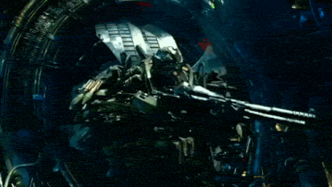 a group of soldiers are fighting a robot in a dark cave