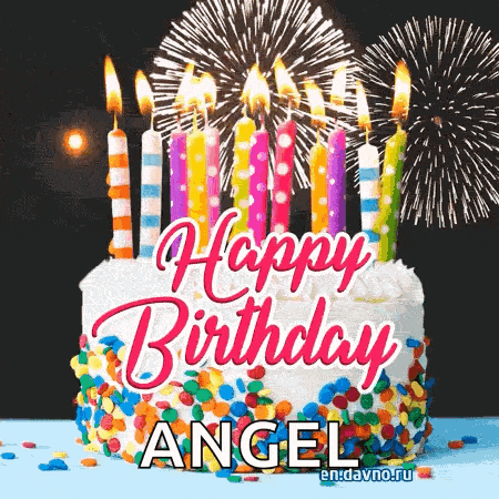 a birthday cake with candles and fireworks in the background