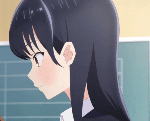 a close up of a girl 's face with a blackboard behind her