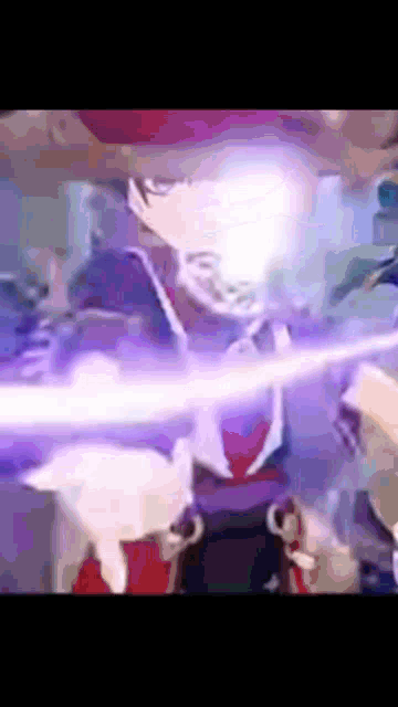 a blurry picture of a person 's face with a purple light coming out of it .