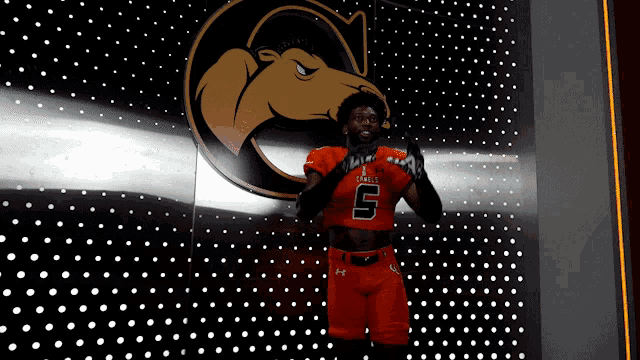 a football player wearing a jersey with the number 5