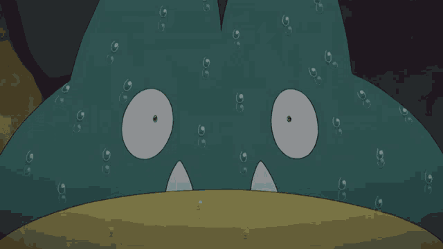 a cartoon drawing of a monster with bubbles on it 's face