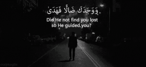 a man walking down a street with the words did he not find you lost so he guided you on the bottom