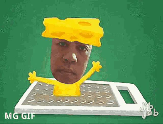 a man with a piece of cheese on his head is on a grater ..